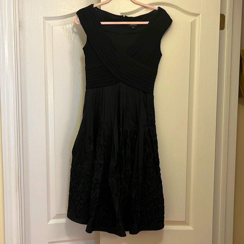 Formal black dress with full skirt